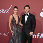 CAP D'ANTIBES, FRANCE - MAY 23: Hande Ercel and Hakan Sabancı attend the amfAR Cannes Gala 30th edition Presented by Chopard and Red Sea International Film Festival at Hotel du Cap-Eden-Roc on May 23, 2024 in Cap d'Antibes, France. (Photo by Eamonn M. McCormack/Getty Images)