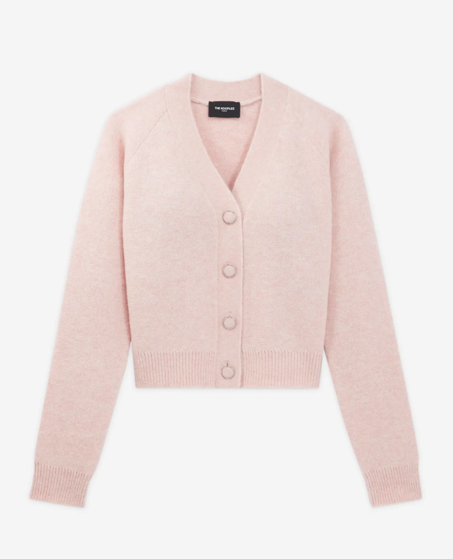 Cárdigan corto rosa de lana con bolsillos de The Kooples. PVP: 110 €
