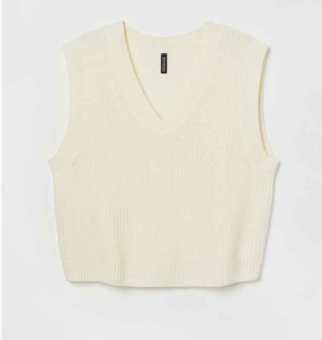 Suéter sin mangas en punto doble con escote en V. De H&M.